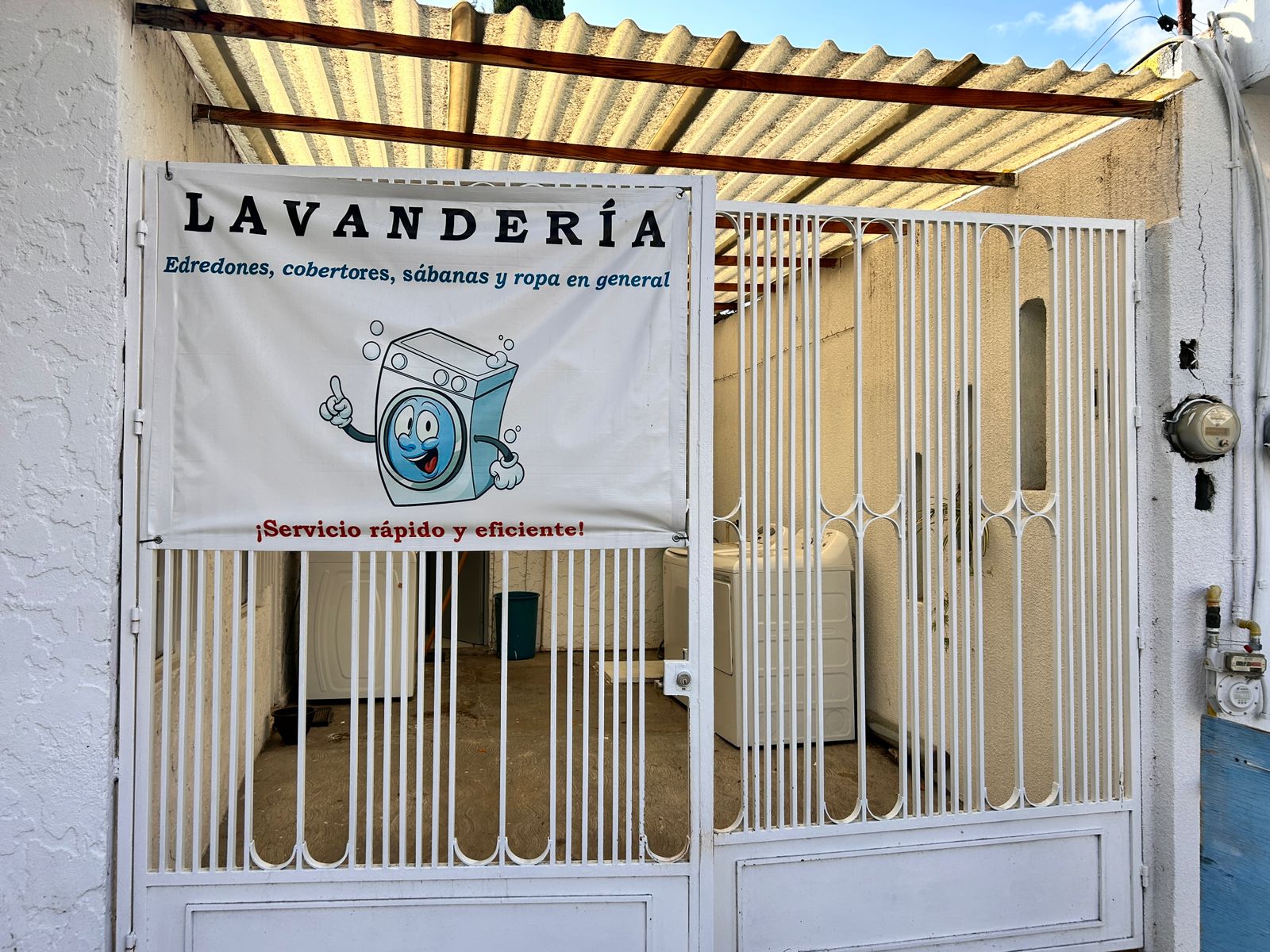 Entrada de Lavandería La Barranca